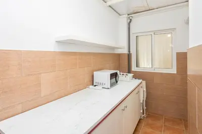 Una cocina o zona de cocina en Casa Playa Melenara