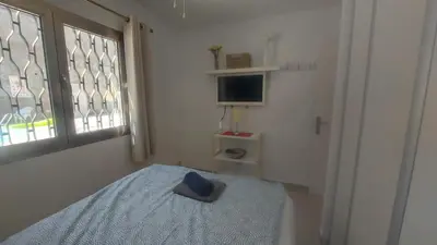 Cama o camas de una habitación en Cayey 2-bedroom Beach Apartment