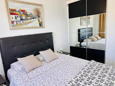Cama o camas de una habitación en BALCON de AMADORES con vista al océano