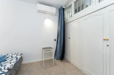 Cama o camas de una habitación en Tamaran Garden View Apartment