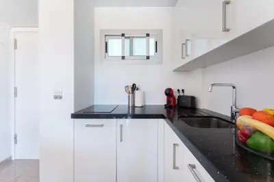 Una cocina o zona de cocina en Palm View Apartment Las Camelias