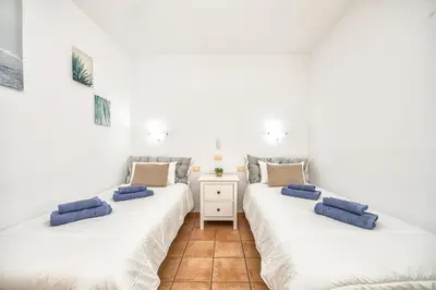 Cama o camas de una habitación en Las Olas Apartments