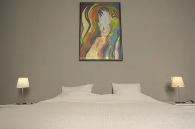 Cama o camas de una habitación en Comfortable Room in Historic Casa Quesada Shared House