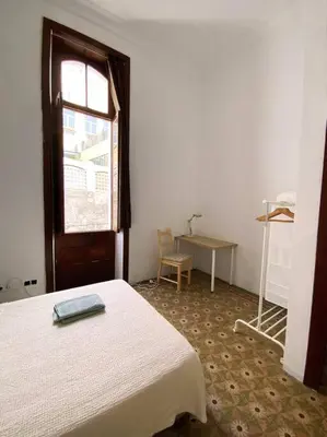 Cama o camas de una habitación en Comfortable Room in Historic Casa Quesada Shared House