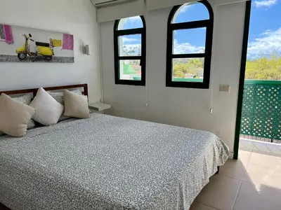 Cama o camas de una habitación en Ilusiónate