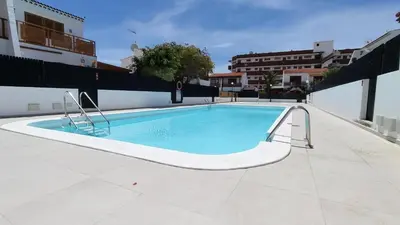 Piscina en o cerca de Luminoso apartamento con piscina y aparcamiento