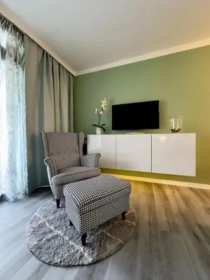 Una televisión o centro de entretenimiento en Appartamento moderno centrale WIFI Free b