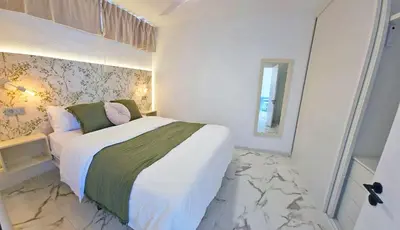 Cama o camas de una habitación en Guayarmina 201