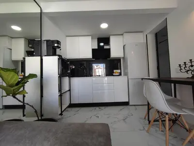 Una cocina o zona de cocina en Bungalow privado junto al Yumbo Centre