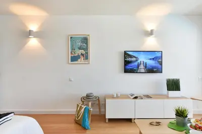 Una televisión o centro de entretenimiento en Apartment Balcon GBFG by VillaGranCanaria
