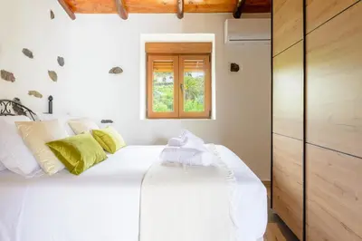 Cama o camas de una habitación en Quinta Entre Palmeras - Viviendas Vacacionales