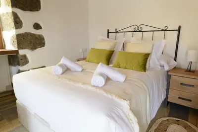 Cama o camas de una habitación en Quinta Entre Palmeras - Viviendas Vacacionales