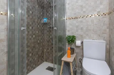 Un baño de Bungalow Playa Flor 82 by Villagrancanaria