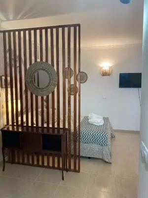 Zona de estar de Arinaga Chakra Home