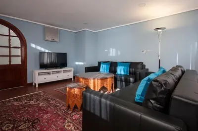 Una televisión o centro de entretenimiento en Terrace Penthouse Las Canteras beach