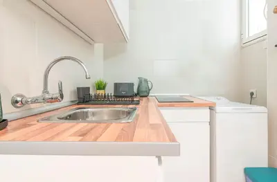 Una cocina o zona de cocina en Estudio primera línea Playa Canteras