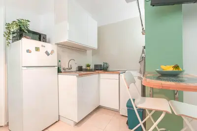 Una cocina o zona de cocina en Estudio primera línea Playa Canteras