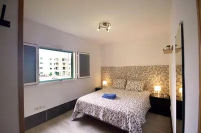 Cama o camas de una habitación en Gran Canaria Stay Las Olas