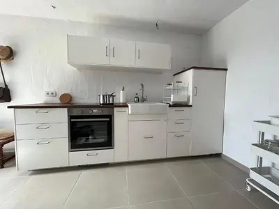 Una cocina o zona de cocina en Apartment La Casa Blanca