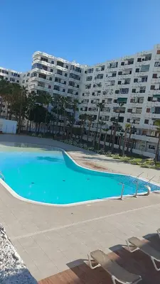 Piscina en o cerca de Piso con Piscina comunitaria