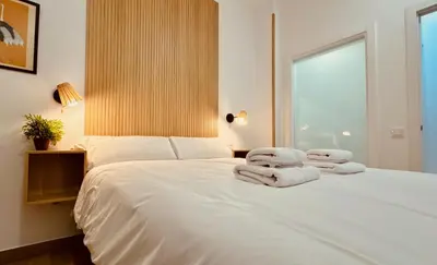 Cama o camas de una habitación en Click&Guest - Modern and Luxury Flat in Telde