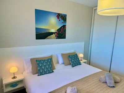 Cama o camas de una habitación en Vista Amadores by SunHousesCanarias