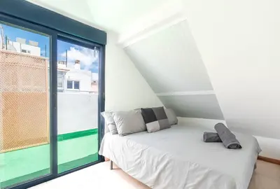 Cama o camas de una habitación en Canteras Beach Duplex