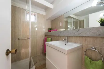 Un baño de Aida - apartamento junto a la playa con vistas al océano