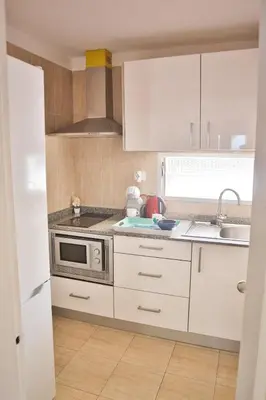 Una cocina o zona de cocina en Aida - apartamento junto a la playa con vistas al océano