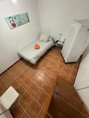 Zona de estar de La casita de Bécquer Habitaciones compartidas