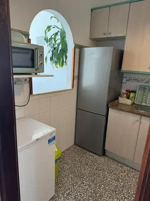 Una cocina o zona de cocina en La casita de Bécquer Habitaciones compartidas