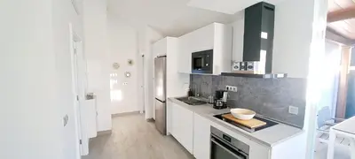 Una cocina o zona de cocina en Las Palomas Bungalow # 38