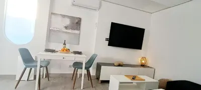 Una televisión o centro de entretenimiento en Las Palomas Bungalow # 38