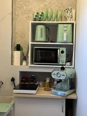 Una cocina o zona de cocina en Room Mayi GC