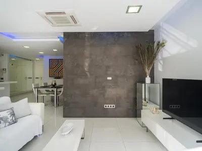 Una televisión o centro de entretenimiento en CITY FAMILY Salvador Monsalud