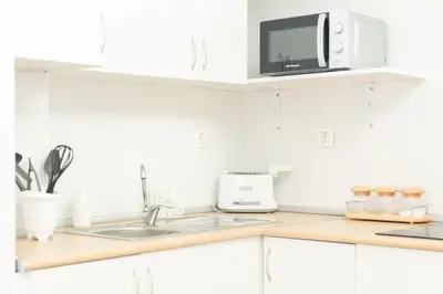 Una cocina o zona de cocina en Linda Reina