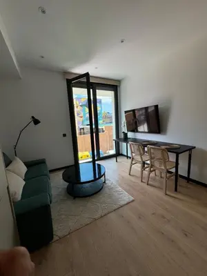 Una televisión o centro de entretenimiento en Oasis Pavia 15