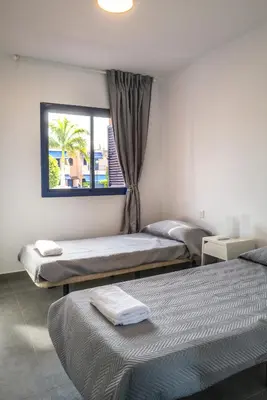 Cama o camas de una habitación en Bungalow - Playa Meloneras