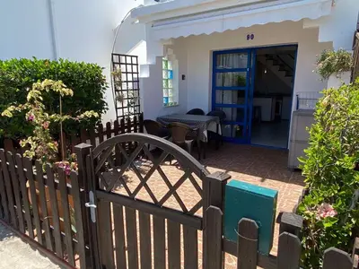 Un balcón o terraza de Sunny poolview bungalow in Maspalomas