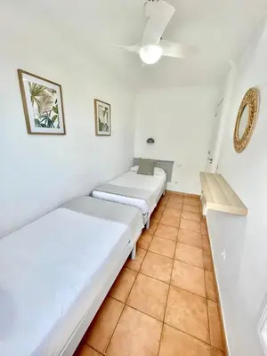 Cama o camas de una habitación en Paradise Brisas