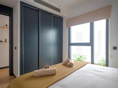 Cama o camas de una habitación en Completo Apartamento con gimnasio playa de Las Canteras A1D
