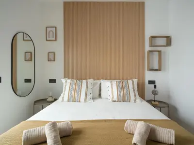 Cama o camas de una habitación en Completo Apartamento con gimnasio playa de Las Canteras A1D