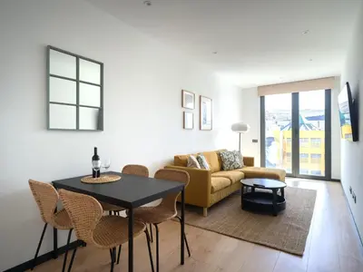 Zona de estar de Gran apartamento cerca de playa Las Canteras con gimnasio A3B