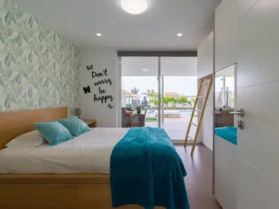 Cama o camas de una habitación en Villa Luz de Maspalomas