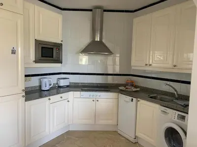Una cocina o zona de cocina en Club puerto Anfi