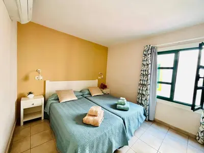 Cama o camas de una habitación en Relax Mogán vivienda vacacional