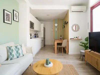 Zona de estar de Gran apartamento con ascensor cerca playa Las Canteras BT3A