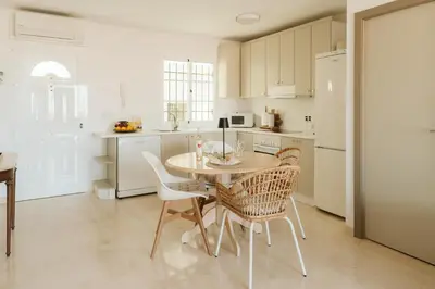 Una cocina o zona de cocina en Ocean Sunset Arguineguin WI-FI POOL Ocean Wiew