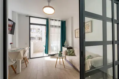 Cama o camas de una habitación en Casita Palmera Las Canteras