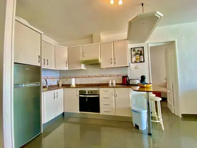 Una cocina o zona de cocina en Beautiful sunset view apartment in Puerto Rico
